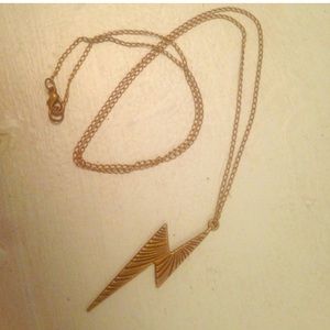 david bowie lightning bolt gold necklace layering